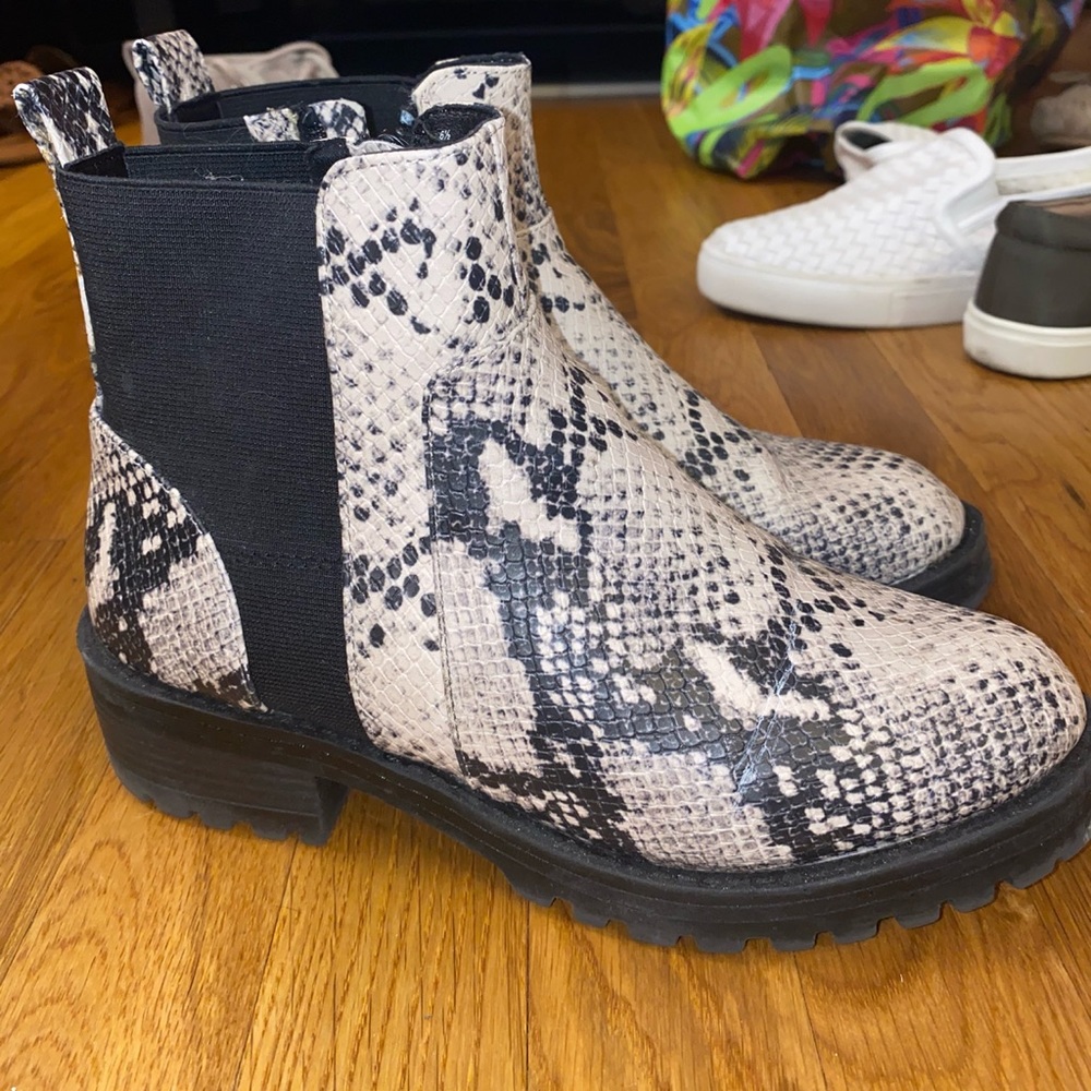 Cream and black snake skin booties.